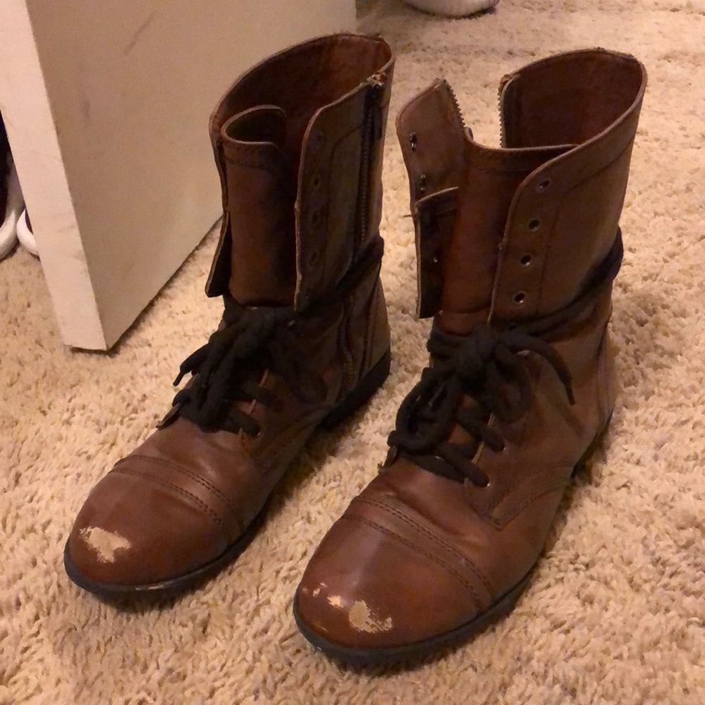 Distressed brown combat boots